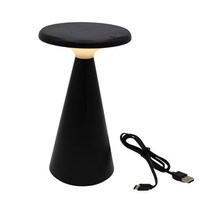Black cone-shaped table lamp with solar panel on top and USB cable on a white background